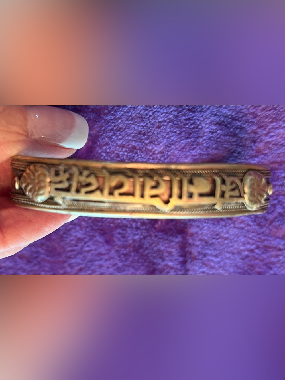 Ranjana script. Gold-tone and copper cuff bracelet. “Om mani padme hum.”